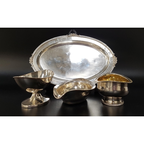 187 - GEORGE III BOAT SHAPED SILVER SALT
raised on an oval foot, London 1803; a George III boat shaped sil... 