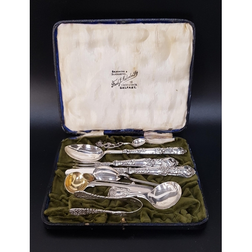 202 - GEORGE V SILVER FRUIT KNIFE, FORK AND SPOON
the handles decorated with grapes, Birmingham 1827 by Ge... 