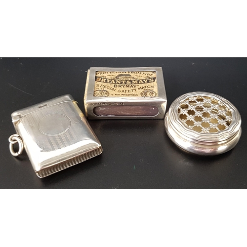 203 - GEORGE V SILVER VESTA CASE
with a suspension ring, Birmingham 1916; a George V silver match box cove... 