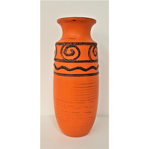 226 - WEST GERMAN POTTERY BALUSTER VASE
with a brown internal glaze to the rim and neck, the body in orang... 