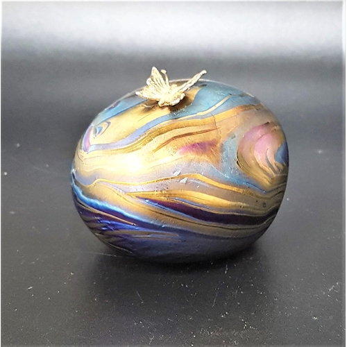 230 - JOHN DITCHFIELD FOR GLASFORM
a purple iridescent paperweight mounted with a silver hallmarked butter... 