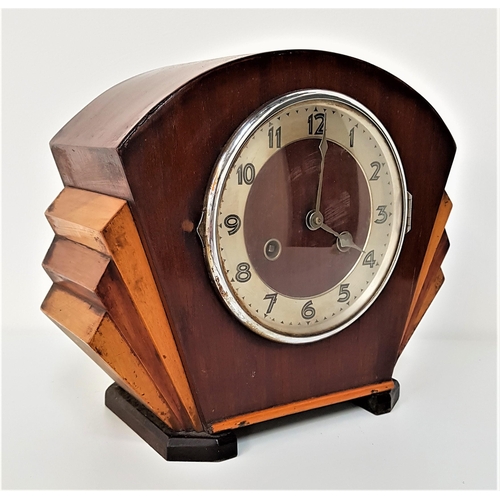 270 - ART DECO MANTLE CLOCK
in a stepped fan shape mahogany case with a circular chapter ring with Arabic ... 