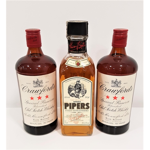 495 - THREE BOTTLES OF BLENDED WHISKY
comprising two bottles of Crawford's special reserve blended old sco... 