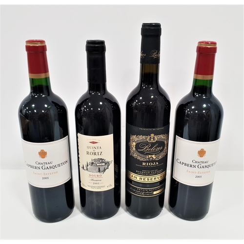 536 - FOUR BOTTLES OF RED WINE 
Comprising of two 2005 Chateau Capbern Gasqueton Saint-Estephe 75cl & 12.5... 