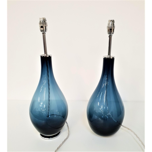 245 - PAIR OF PEAR DROP GLASS TABLE LAMPS
in pale blue glass, 51cm high