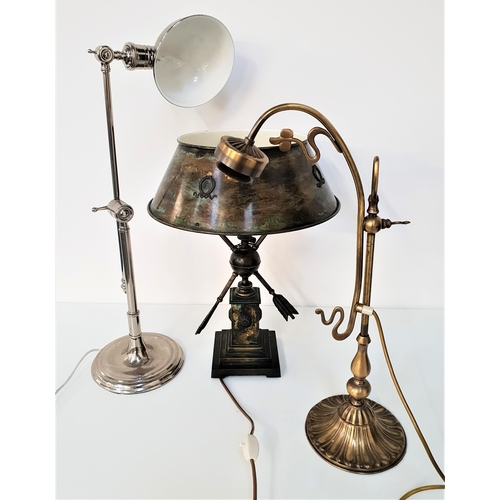 312 - ART NOUVEAU STYLE LAMP
in brass and raised on a circular base with a double shaped column, 59cm high... 