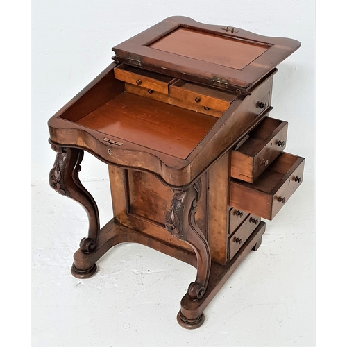 441 - VICTORIAN WALNUT DAVENPORT
with a lift up lid inset with a green leather, the interior with two draw... 