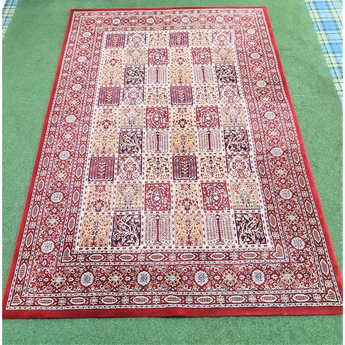 443 - VALBY RUTA RUG
with a claret ground and floral panels, 300cm x 200cm