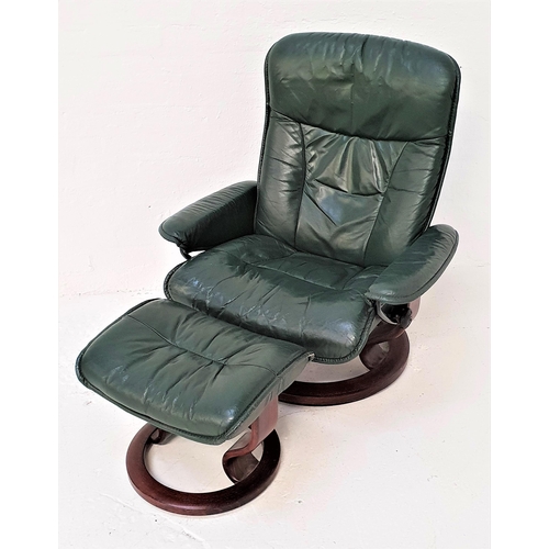 469 - ERKORNES STRESSLESS RECLINING ARMCHAIR
in green leather with a matching footstool (2)