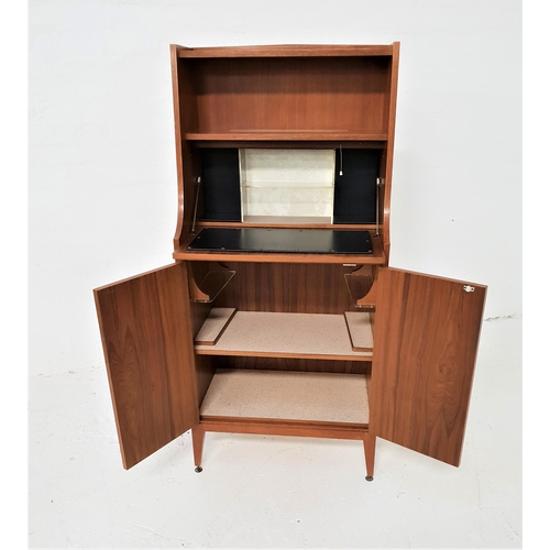 473 - 1970s TEAK ILLUMINATED CABINET
with a shelf above shaped sides and an illuminated shelf with a fall ... 