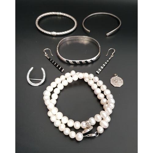 167 - SELECTION OF SILVER JEWELLERY
comprising a pearl necklace with central silver heart pendant; a Mexic... 