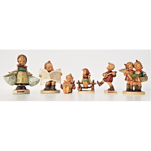 241 - SIX GOEBEL FIGURINES
Mothers Darling, 14cm high, two girls, 12cm high, Latest News, 13cm high, Happi... 