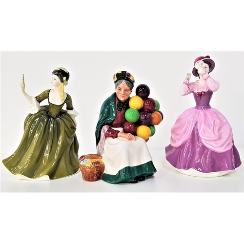 242 - ROYAL DOULTON FIGURINES
The Old Balloon Seller, HN1315, Lady Pamela, HN2718 and Simone, HN2378 (3)