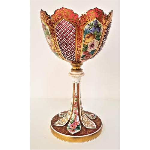 248 - 19th CENTURY BOHEMIAN GLASS TABLE CENTRE PIECE
in the form of a large goblet decorated with panels o...