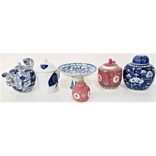 256 - SELECTION OF EAST ASIAN ITEMS
including two white tazzas, cup and cover decorated with fish, blue an... 