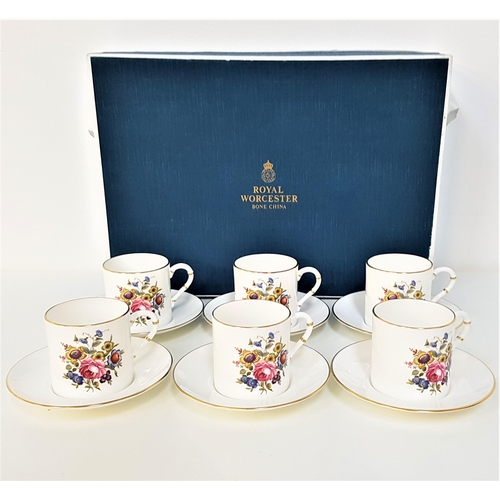 262 - ROYAL WORCESTER BOXED COFFEE SET
comprising six cups and saucers, decorated with flowers and gilt hi... 