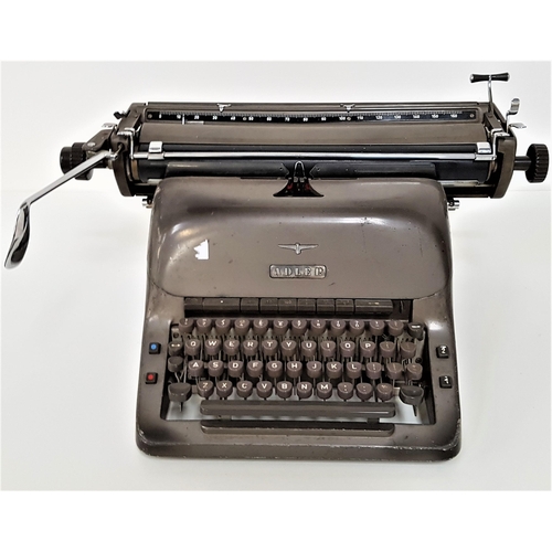 296 - VINTAGE ADLER TYPEWRITER
circa 1950