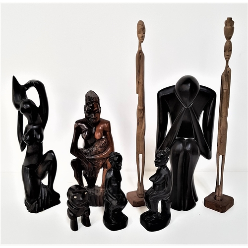 306 - SELECTION OF CARVED AFRICAN FIGURINES
ranging in height from 10cm to 47cm (8)