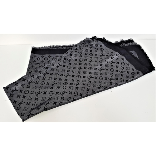 369 - LOUIS VUITTON BLACK AND SILVER MONOGRAM SCARF/SHAWL
with reversible tones to each side, 47% silk, 26... 