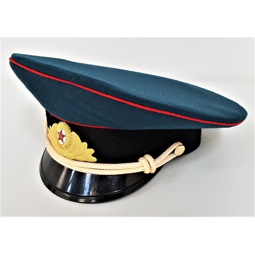 371 - SOVIET USSR MILITARY ARMY OFFICERS PARADE HAT
in blue cloth with red piping above the red star with ... 