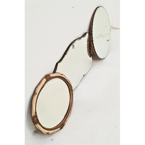 429 - 1950s RECTANGULAR WALL MIRROR
with a wavy edge, 65.5cm wide, a circular wall mirror with a scalloped... 