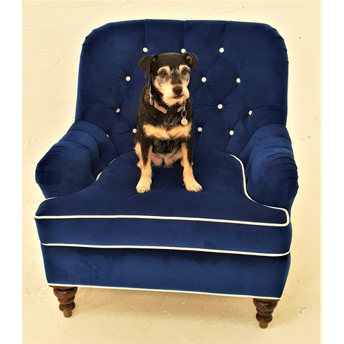 438 - LATE VICTORIAN ARMCHAIR
with a shaped button back and stuffover shaped seat cushion, upholstered in ... 