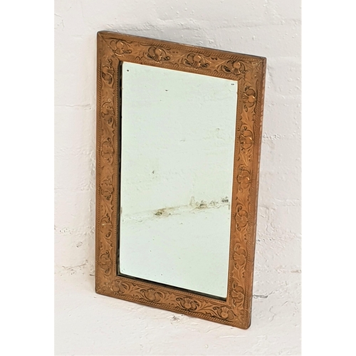 442 - BRASS RECTANGULAR WALL MIRROR
with a bevelled plate, the frame embossed with thistles, 54cm x 33.5cm