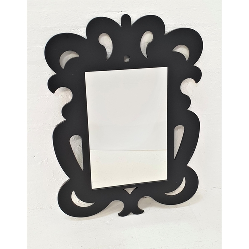 466 - ORNATE SHAPED WALL MIRROR
the pierced and carved frame with a rectangular plate, 117cm x 85cm