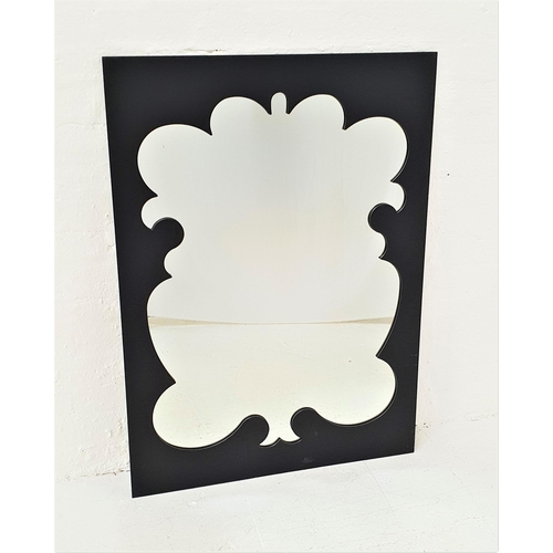 467 - LARGE RECTANGULAR WALL MIRROR
with a decorative carved frame and plain plate, 117cm x 85cm