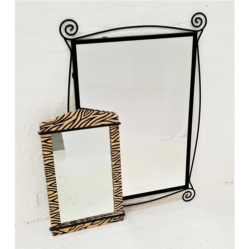 481 - WROUGHT IRON WALL MIRROR
in a shaped frame with a plain plate, 102cm x 73.5cm, together with a Zebra... 