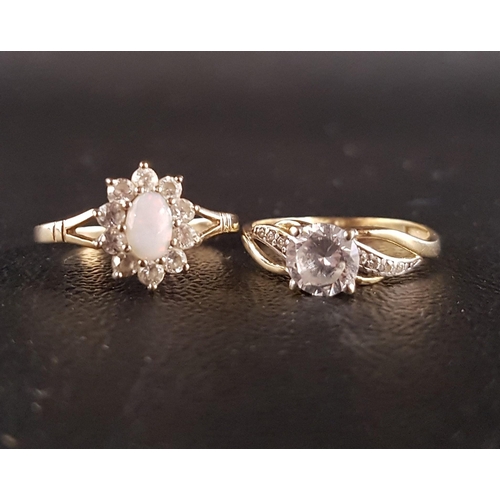 165 - OPAL AND CZ CLUSTER RING AND A CZ SOLITAIRE RING
both on nine carat gold shanks, ring sizes O and P ... 