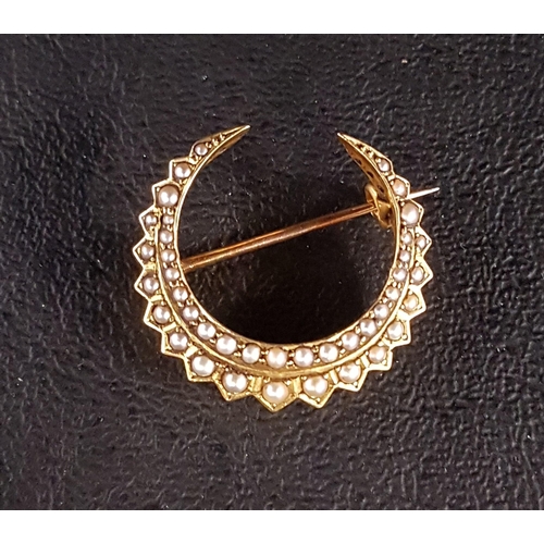 151 - SEED PEARL SET UNMARKED GOLD CRESCENT BROOCH
approximately 2.3cm wide and 4 grams