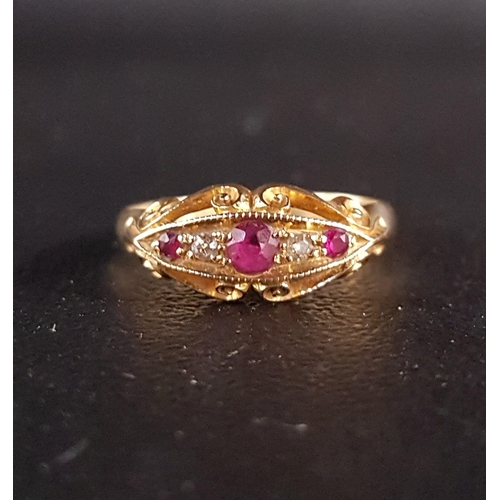 156 - GRADUATED RUBY AND DIAMOND FIVE STONE RING
on eighteen carat gold shank, with pierced scroll decorat... 