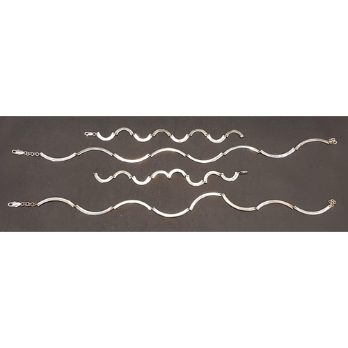 162 - TWO SILVER WAVY LINK NECKLACES WITH MATCHING BRACELETS
the necklaces approximately 43cm long and the... 