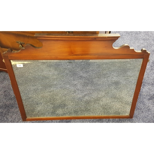 459 - MAHOGANY FRAMED WALL MIRROR
with a bevelled plate, 95cm wide 
Note: originally from a dressing chest