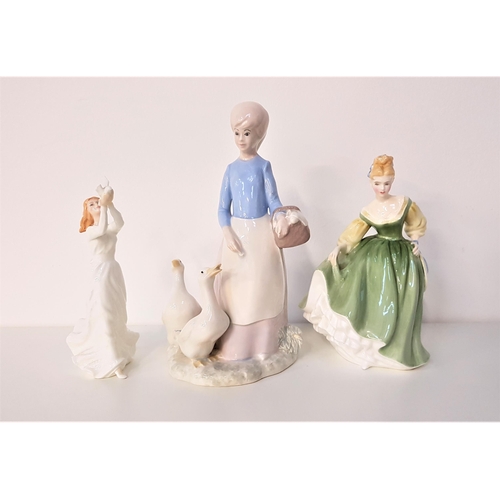 140 - ROYAL DOULTON FIGURINE
Fair Lady, HN2193, 19cm high; Thinking Of You, HN3124, 17cm high; and Jean by... 