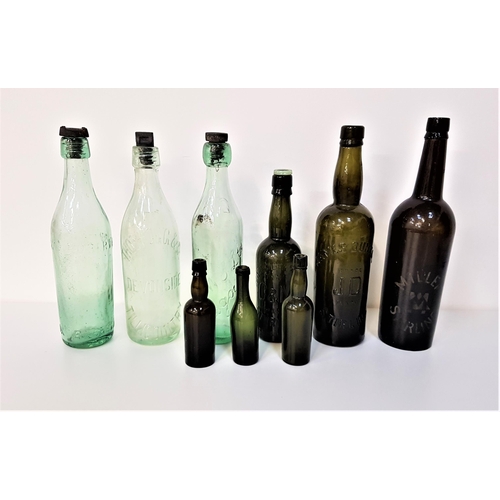 148 - SELECTION OF VINTAGE GLASS BOTTLES
including a clear glass S.G.W.S. Ltd of Glasgow with stopper, cle... 