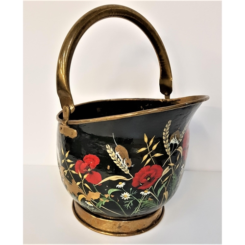 168 - HELMET SHAPED BRASS COAL SCUTTLE
with a fold over handle, the body painted with harvest mice, corn a... 