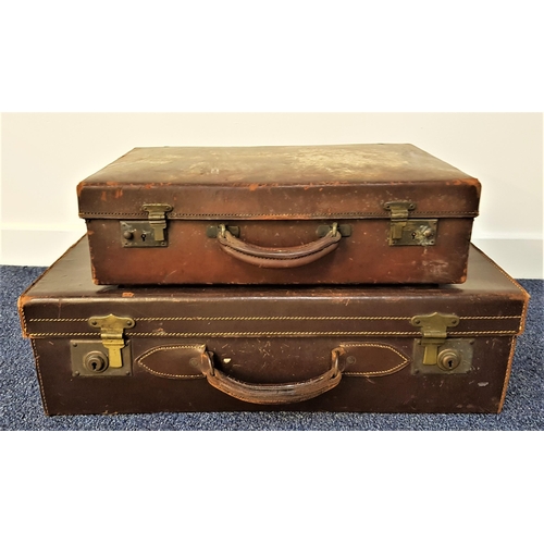 174 - VINTAGE BROWN LEATHER SUITCASE
with leather carry handle and two brass locks, 18cm high x 61cm wide ... 