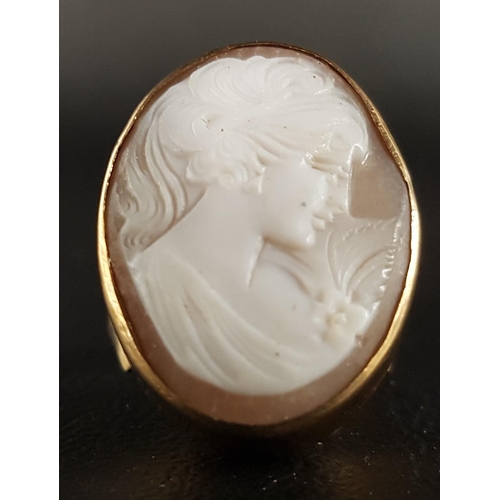 38 - LARGE CAMEO DRESS RING
the oval shell cameo depicting a female bust in profile, the cameo approximat... 