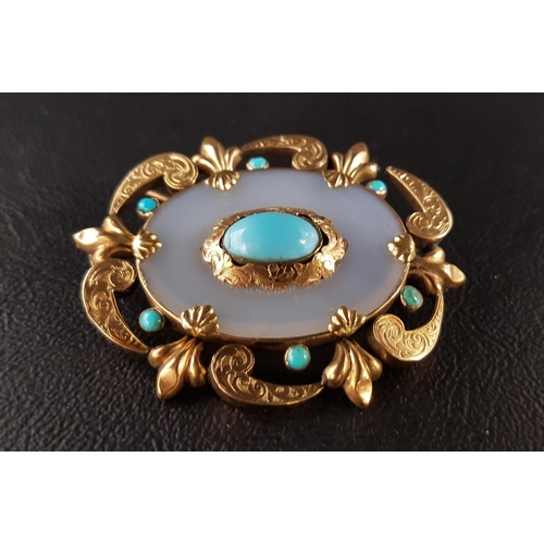 107 - VICTORIAN TURQUOISE AND AGATE SET BROOCH
in unmarked gold scroll mount, 5cm wide