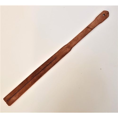 184 - LEATHER TWO TAIL TAWSE
by maker John. J. Dick, Lochgelly, 53.5cm long