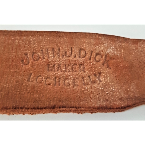 184 - LEATHER TWO TAIL TAWSE
by maker John. J. Dick, Lochgelly, 53.5cm long