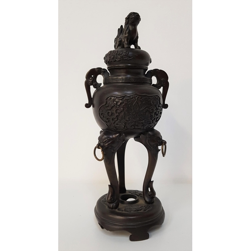 190 - CHINESE BRONZED CENSER
with dog of foe finial to the cover, the body with scroll handles and and fol... 