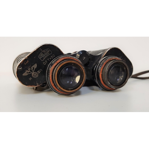 266 - WWII GERMAN OFFICERS BINOCULARS
by Carl Zeiss, with a blackened body and top plate marked with the G... 