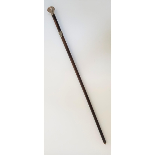 271 - NAZI GERMAN WALKING STICK
with a totenkopf embossed top above a Nazi war eagle, lacking metal tip to... 