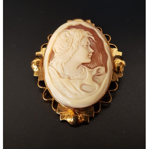26 - SHELL CAMEO BROOCH
depicting a female bust in profile, in nine carat gold mount, 4.5cm high