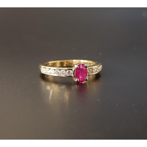 44 - RUBY AND DIAMOND RING
the central oval cut ruby approximately 0.35cts flanked by channel set diamond... 