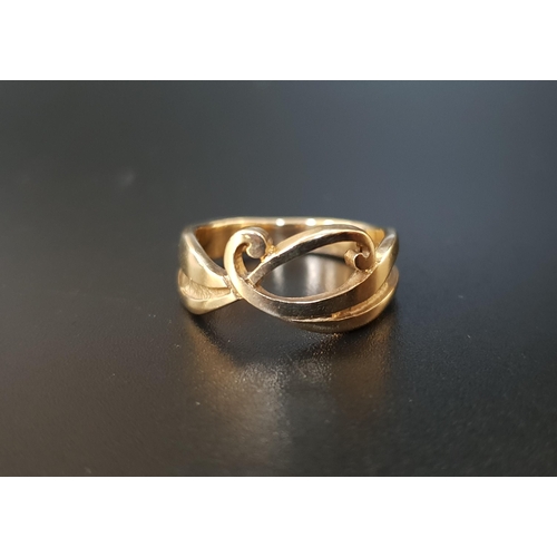 18 - NINE CARAT GOLD SHEILA FLEET 'NEW WAVE' RING
of entwined scroll design, ring size L and approximatel... 