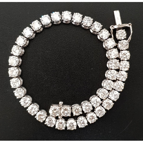 40 - IMPRESSIVE DIAMOND TENNIS BRACELET
the 43 round brilliant cut diamonds totaling approximately 10.75c... 